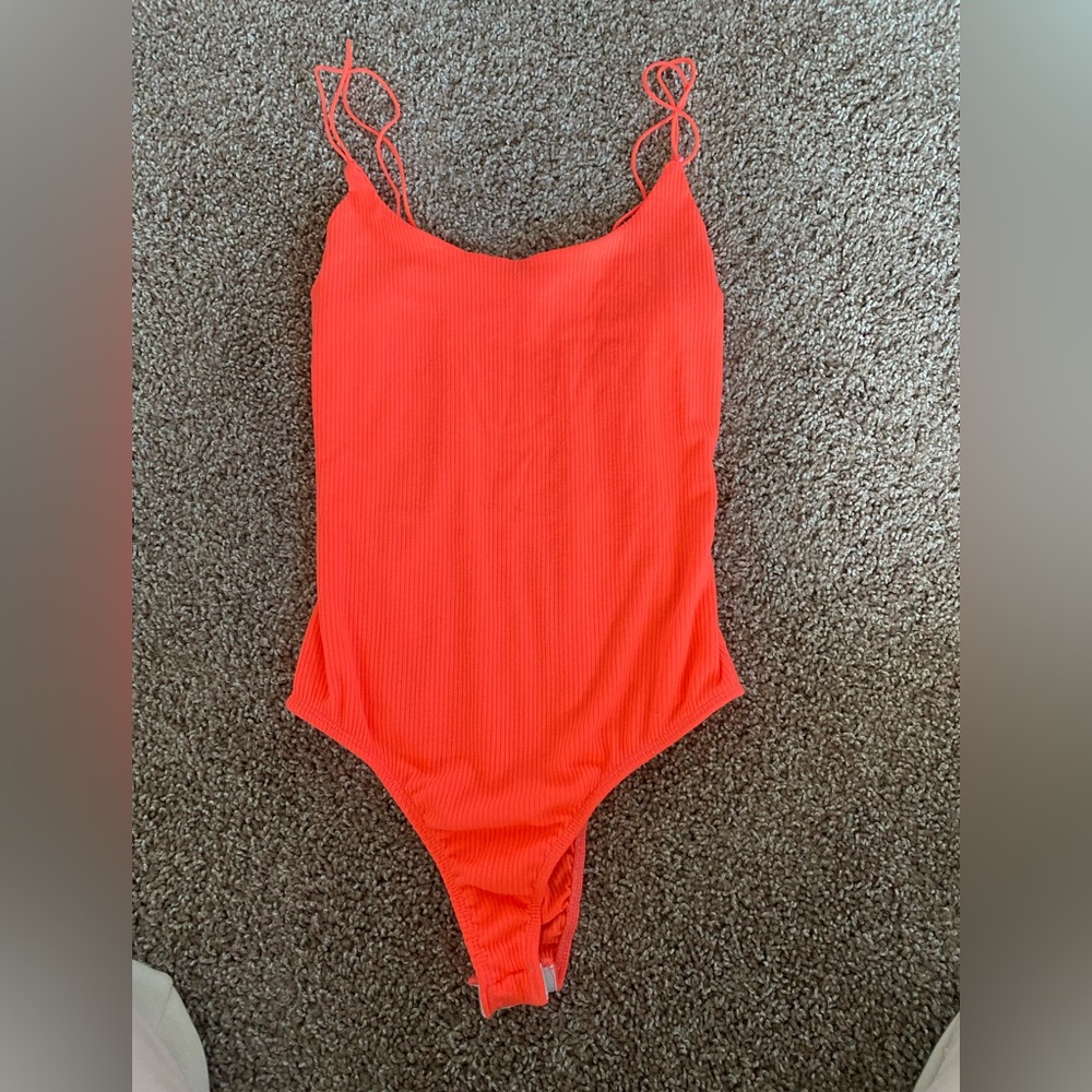 Women’s size large rubbed cotton body suit